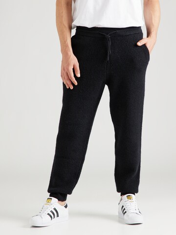 ABOUT YOU x Jaime Lorente Tapered Broek 'Taylan' in Zwart: voorkant