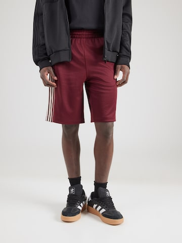 ADIDAS ORIGINALS Loose fit Trousers in Brown: front