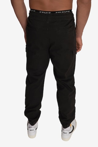 Effilé Pantalon cargo STHUGE en noir