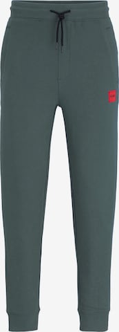 Pantalon HUGO Red en vert : devant