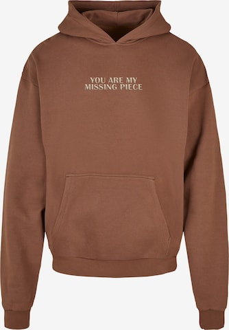 Merchcode Sweatshirt 'Missing Piece' in Braun: predná strana