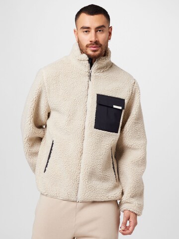 Veste mi-saison Cleptomanicx en beige : devant