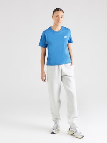 new balance - Camisa funcionais 'Essentials' em azul