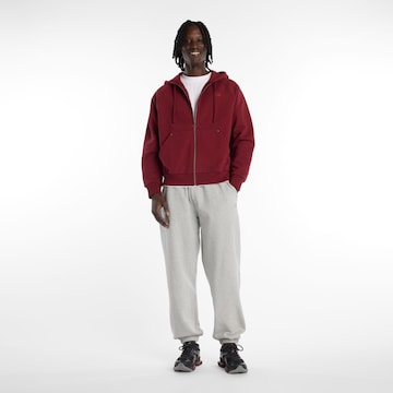 new balance - Sudadera con cremallera en rojo