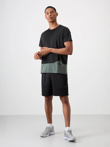 T-Shirt fonctionnel Tommy Life en noir