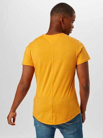 Maglietta 'Jasper' di Tommy Jeans in arancione