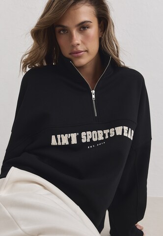 Felpa sportiva 'Varsity' di Aim'n in nero