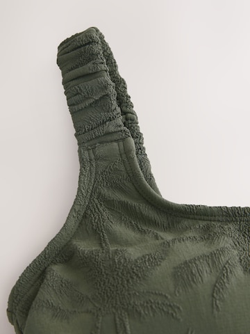 Costume intero di Next in verde