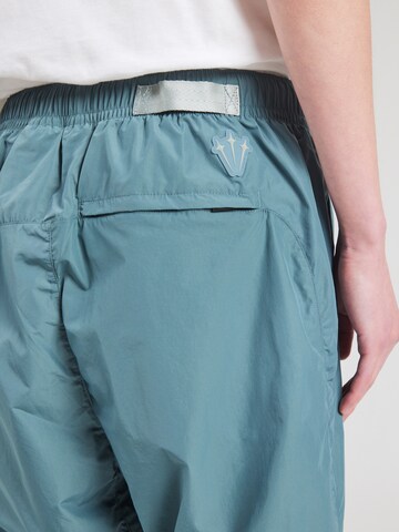 Nike Sportswear Tapered Παντελόνι 'NOCTA' σε πράσινο