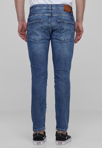 Karl Kani Skinny Jeans in Blauw