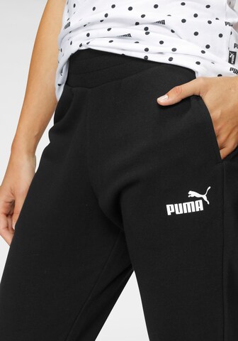 PUMA Tapered Sporthose in Schwarz