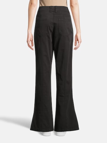 AÉROPOSTALE Flared Trousers in Black