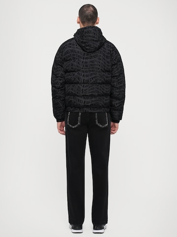 Geacă de iarnă de la Versace Jeans Couture pe negru