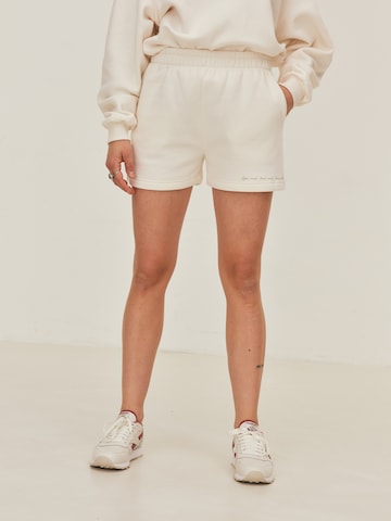 ABOUT YOU x Sofia Tsakiridou Regular Pants 'Marlo' in White: front