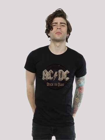 F4NT4STIC Shirt 'AC/DC Rock or Bust' in Zwart: voorkant