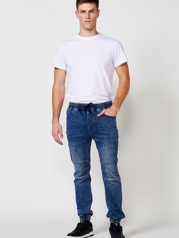 KOROSHI Tapered Jeans in Blue
