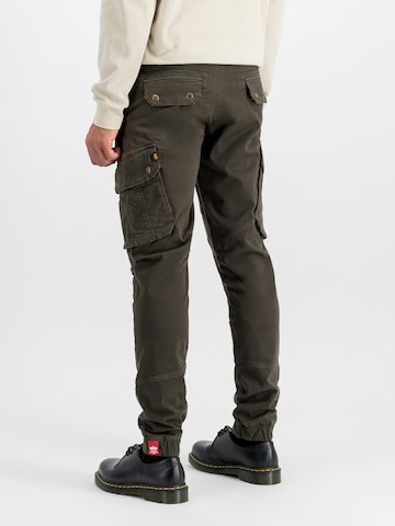 ALPHA INDUSTRIES Tapered Cargo trousers 'Combat' in Brown