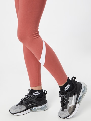 Skinny Leggings 'Essential' de la NIKE pe portocaliu