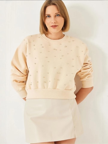 Felpa di Bianco Lucci in beige: frontale