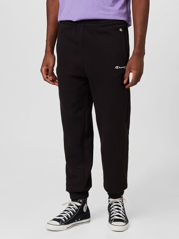 Champion Authentic Athletic Apparel Tapered Sports trousers in Black: front