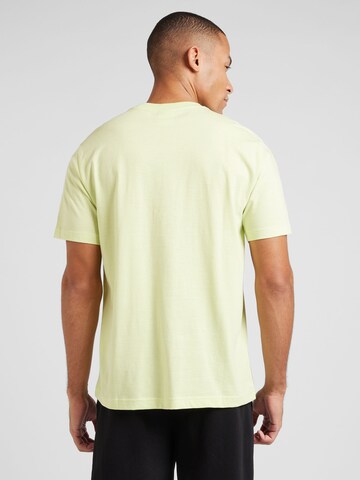 Maglietta di Champion Authentic Athletic Apparel in giallo