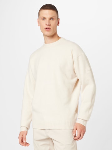 Calvin Klein Пуловер в бежово: отпред