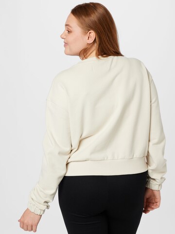 Bluză de molton de la Calvin Klein Jeans Curve pe bej