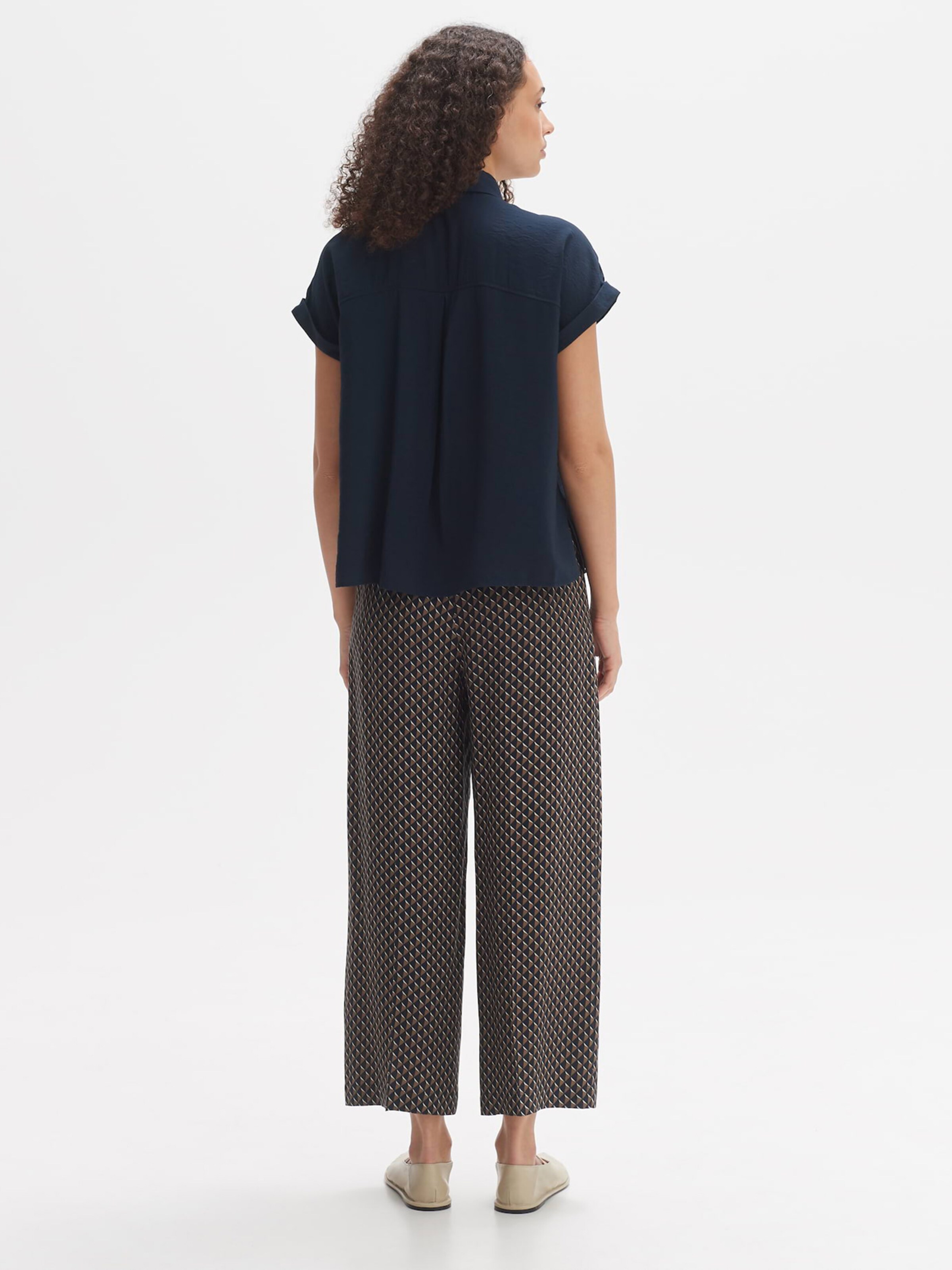 Opus vetement femme sale