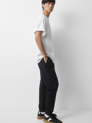 Pull&Bear Tapered Trousers in Black: front