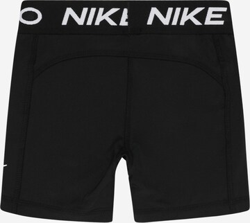 Skinny Pantalon Nike Sportswear en noir