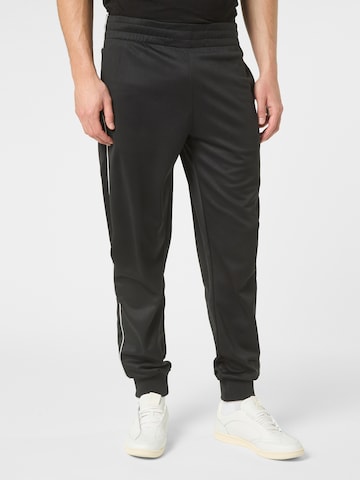 FILA Regular Housut 'SAGANO regular track pants' värissä musta: etupuoli
