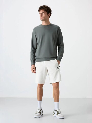 Sweat-shirt Tommy Life en beige