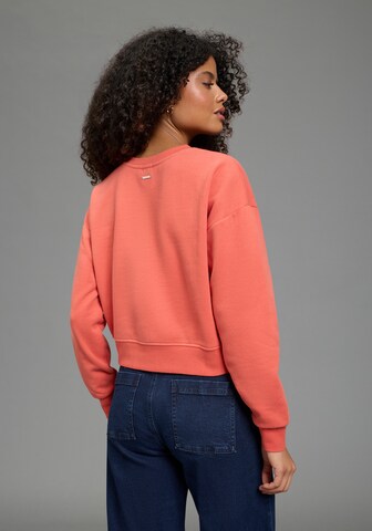 LAURA SCOTT Sweatshirt in Orange