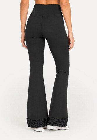 Smilodox Slimfit Schlagleggings ' Lithara Solid ' in Schwarz