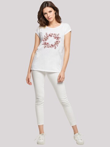 T-shirt 'Rosa Frühlings Blumenkranz Dekor' F4NT4STIC en blanc