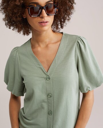 Bluză de la WE Fashion pe verde