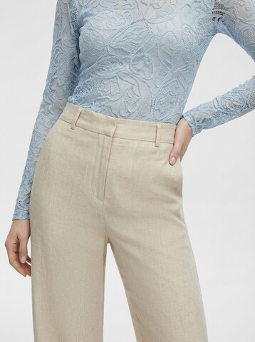 KAVAZI Loose fit Trousers in Beige