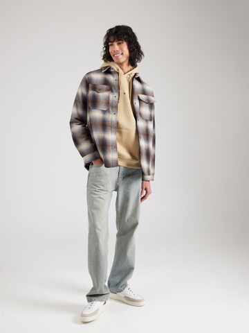 Felpa di Tommy Jeans in marrone