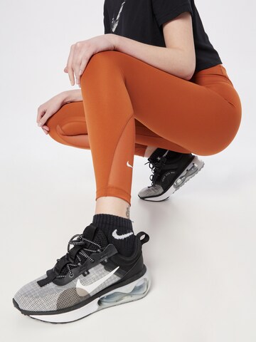 NIKE Skinny Sporthose 'One' in Orange