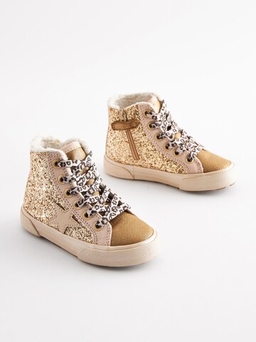 Baskets Next en or