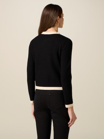 Cardigan oltre en noir