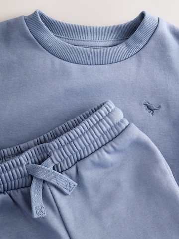 Set Next en bleu