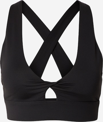 Fabletics Korzetová Sportovní podprsenka 'Oasis Twist' – černá: přední strana