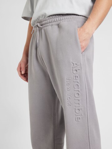 Abercrombie & Fitch Tapered Trousers 'EMEA-EX' in Grey