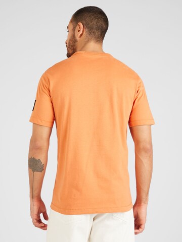 Calvin Klein Jeans T-shirt i orange