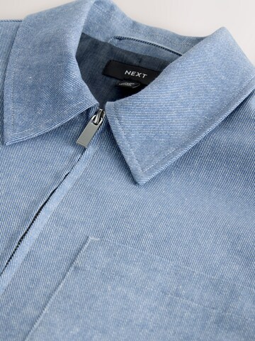 Next Tussenjas in Blauw