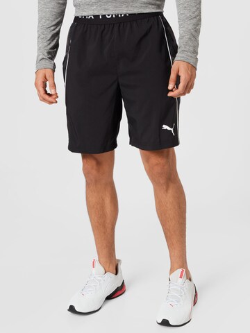 PUMA - Regular Calças de desporto em preto: frente