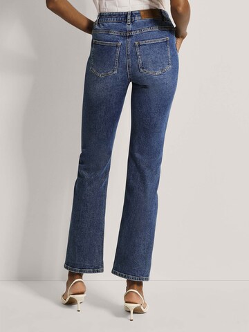 Coupe slim Jean MADELEINE en bleu