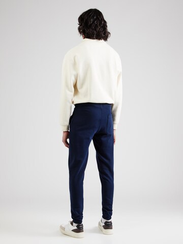 Effilé Pantalon Tommy Jeans en bleu