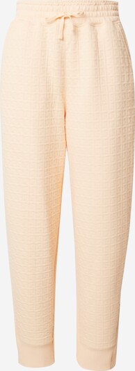 Sportinės kelnės iš NIKE, spalva – pilka / persikų spalva, Prekių apžvalga